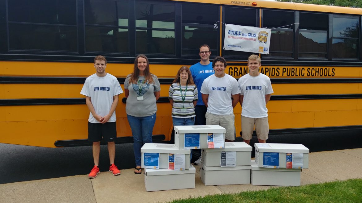 Community Pulls Together to Stuff the Bus – and Sets a Record